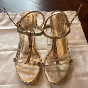 Lilly Pulitzer gold wedges. Size 7